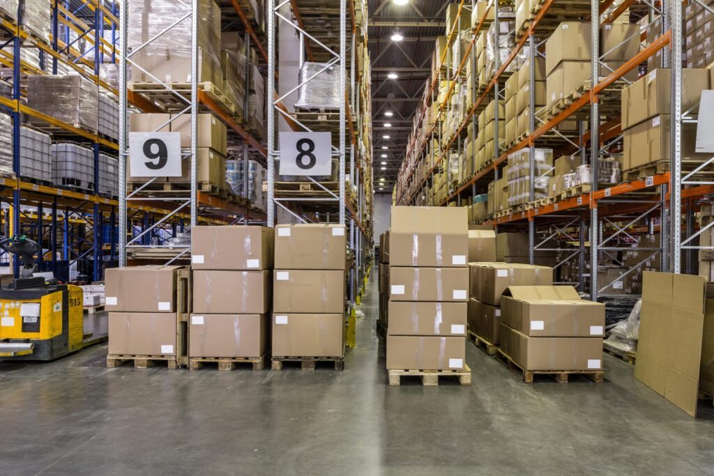 Pallets of residual stock between the racking