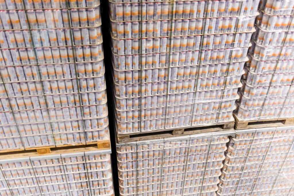 Pallets of surplus stock stacked in the warehouse